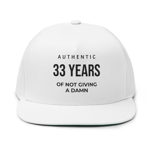 33 Years Embroidered Flat Bill Cap — "Authentic 33 Years of Not Giving a Damn" Birthday Snapback